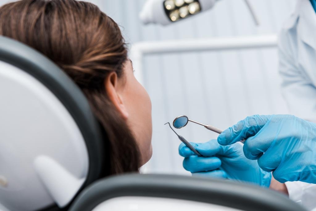 stock photo cropped view dentist blue latex